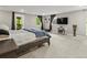 Spacious main bedroom with ample natural light, neutral carpet, and modern fixtures and fittings at 280 E 11Th Ave, Broomfield, CO 80020