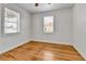 Sunny bedroom with hardwood floors and ample natural light at 6670 Hooker St, Denver, CO 80221