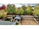 Expansive backyard with patio, gazebo, mature trees, and space for outdoor activities at 9011 Sandpiper Dr, Longmont, CO 80504