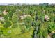 Aerial view showing home's location in a wooded, affluent neighborhood at 6325 E Tufts Ave, Cherry Hills Village, CO 80111