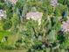 House surrounded by green landscape, viewed from above at 6325 E Tufts Ave, Cherry Hills Village, CO 80111