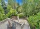 Elevated view of backyard oasis with stream and patio at 6325 E Tufts Ave, Cherry Hills Village, CO 80111