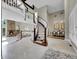 Grand curved staircase and high ceilings at 6325 E Tufts Ave, Cherry Hills Village, CO 80111