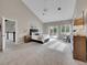 Large main bedroom with high ceilings and access to a deck at 6325 E Tufts Ave, Cherry Hills Village, CO 80111