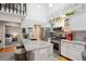 Modern kitchen showcasing stainless steel appliances, granite countertops, and a stylish design with an open layout at 8010 Holland Ct # D, Arvada, CO 80005