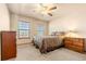 Bright bedroom with carpeted floor and ceiling fan at 7562 E 130Th Cir, Thornton, CO 80602