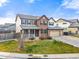 Two-story home with a two-car garage and nicely landscaped yard at 7562 E 130Th Cir, Thornton, CO 80602