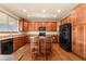 Modern kitchen with stainless steel appliances and hardwood floors at 7562 E 130Th Cir, Thornton, CO 80602