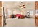 Large main bedroom with ceiling fan and carpeted floors at 7562 E 130Th Cir, Thornton, CO 80602