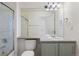 Bathroom with a single vanity, toilet and shower/tub combo at 7944 E Lowry Blvd, Denver, CO 80230