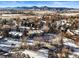 Aerial view of community with mountain views and snow at 6505 Kalua Rd # 204B, Boulder, CO 80301