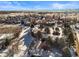 Aerial perspective of condo complex nestled in a snow-covered landscape at 6505 Kalua Rd # 204B, Boulder, CO 80301