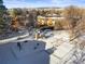 Community playground area covered in snow at 6505 Kalua Rd # 204B, Boulder, CO 80301