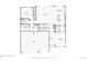 Detailed first-floor layout showcases open-concept kitchen, Gathering room, and garage, ideal for modern living at 20223 Terrace View Dr, Parker, CO 80134