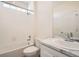 Bright bathroom with white subway tile shower and marble vanity at 12898 King St, Broomfield, CO 80020