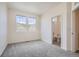 Spacious bedroom with ensuite bathroom access and large windows at 12898 King St, Broomfield, CO 80020