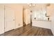 View of the staircase, doors, and open layout, seamlessly connecting the entryway to other living spaces at 12898 King St, Broomfield, CO 80020