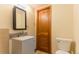 Updated bathroom with a modern vanity, updated fixtures, and a linen closet at 4850 Forest Hill Rd, Evergreen, CO 80439