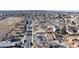 Aerial view of a residential neighborhood featuring tree-lined streets and single-Gathering homes at 7103 Depew Ct, Arvada, CO 80003