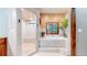 Bathroom features a separate tub and shower; the perfect relaxation space at 12655 Greenland Acres Rd, Larkspur, CO 80118