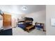 Bedroom with bunkbeds and unique storage shelves for a cozy space at 12655 Greenland Acres Rd, Larkspur, CO 80118