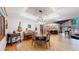 Dining room with hardwood floors, decorative light fixtures and easy access to kitchen at 12655 Greenland Acres Rd, Larkspur, CO 80118