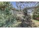 A distant view of the back of the home with a white deck at 6821 W Yale Ave, Lakewood, CO 80227