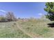 Rolling hills are the backdrop to this beautiful backyard at 6821 W Yale Ave, Lakewood, CO 80227