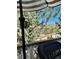 Relax on this cozy patio with mature trees and a view at 6821 W Yale Ave, Lakewood, CO 80227