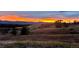 Beautiful sunset over the rolling hills at 6821 W Yale Ave, Lakewood, CO 80227