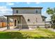 Beautiful backyard featuring a covered patio and a lush green lawn at 3224 W Dakota Ave, Denver, CO 80219