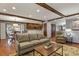 Open living room and kitchen area, perfect for entertaining and Gathering gatherings at 9161 W Hialeah Pl, Littleton, CO 80123