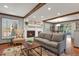 Comfortable living room with a white brick fireplace and lots of natural light at 9161 W Hialeah Pl, Littleton, CO 80123