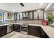Sleek, modern kitchen with stainless steel appliances and elegant cabinetry, plus a plant at 930 Acoma St # 106, Denver, CO 80204