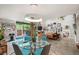 Spacious living room with an open floor plan, abundant artwork, and lots of natural light at 930 Acoma St # 106, Denver, CO 80204