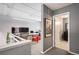 Open-concept office space with modern desk and views of a well-decorated hallway and another office at 930 Acoma St # 106, Denver, CO 80204