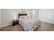 Bedroom with a double bed, nightstand, and window at 7251 S Xenia Cir # F, Centennial, CO 80112