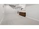 Spacious carpeted basement area with a wet bar and an access to the upper floors at 2515 N Gaylord St, Denver, CO 80205