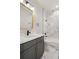 Stylish bathroom with marble tile, modern vanity, and a shower-tub combination at 2515 N Gaylord St, Denver, CO 80205
