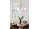 Modern dining area with a sleek light fixture and minimalist decor at 2515 N Gaylord St, Denver, CO 80205