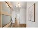 Bright foyer showcasing hardwood floors, modern lighting, and a welcoming entrance at 2515 N Gaylord St, Denver, CO 80205