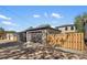 Multiple garages with attached parking pad and new privacy fence at 2515 N Gaylord St, Denver, CO 80205