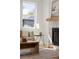Inviting living room with a fireplace, lots of natural light, and comfortable seating at 2515 N Gaylord St, Denver, CO 80205