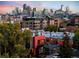 Fantastic twilight view of the Denver skyline, modern architecture, and mature trees at 3334 Tejon St # 1, Denver, CO 80211