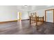 Hardwood floored living space offering a welcoming ambiance and functional design at 8182 3Rd Ave, Arvada, CO 80007