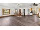 Spacious living room with hardwood floors, great natural light, and open layout at 8182 3Rd Ave, Arvada, CO 80007