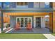Inviting front porch showcases modern design and a cozy seating area at 3657 Pecos St, Denver, CO 80211