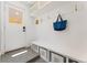 Functional mudroom with built-in storage, bench seating, and hooks for organization, ideal for busy households at 3657 Pecos St, Denver, CO 80211