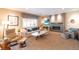 Cozy living room with a fireplace, comfortable seating, and a relaxing atmosphere at 565 Pikes View Dr, Erie, CO 80516