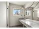 Bathroom with a long marble countertop at 6196 S Rosewood Dr, Littleton, CO 80121